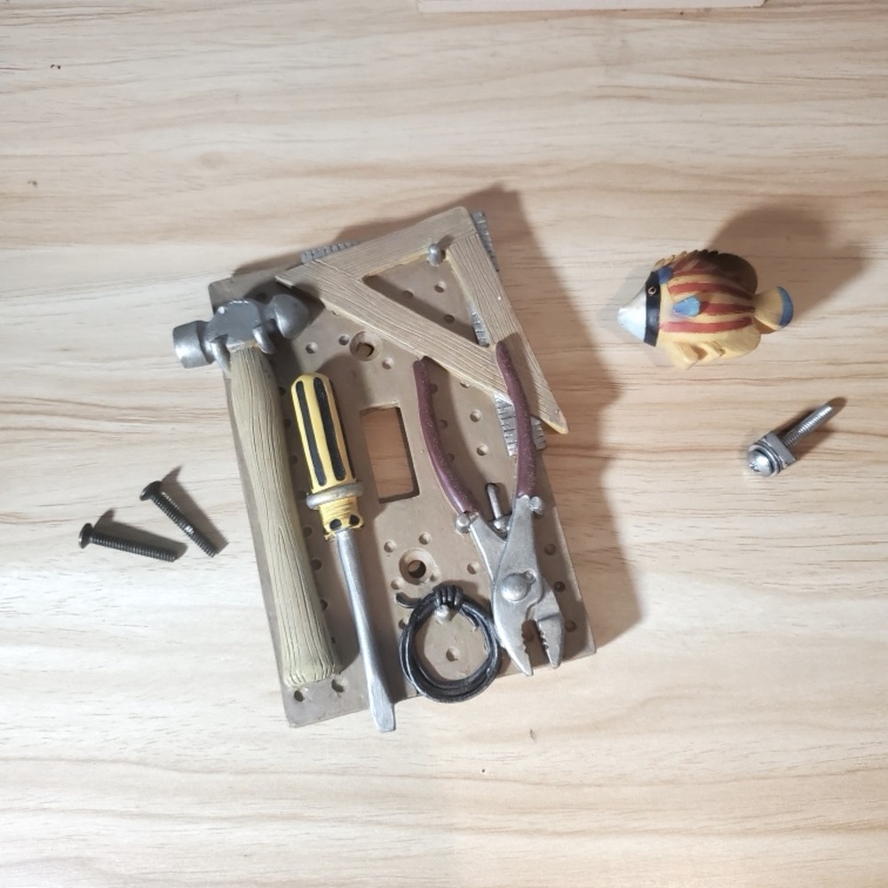 3-D Decorative Light switch plate and drawer pull.